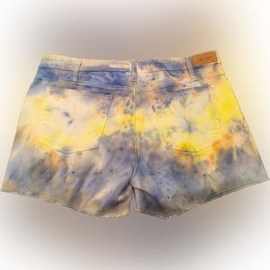 Wicked cool, upcycled ice-dyed Levi’s cutoff shorts. Size 12.